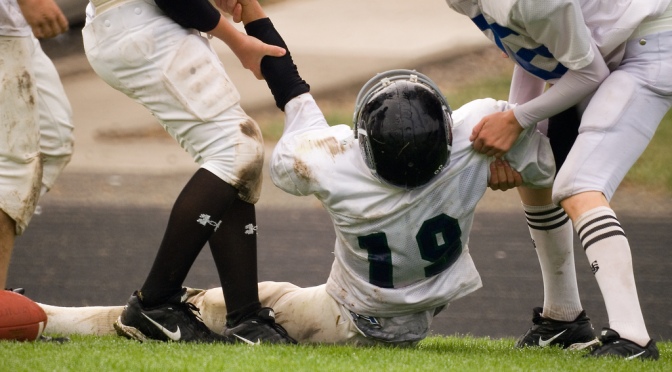 New Research Highlights Youth Football Players’ Brain Injury Risk